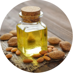 jar of almond oil with shelled almonds